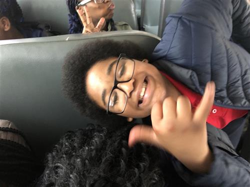 students having fun on the bus 